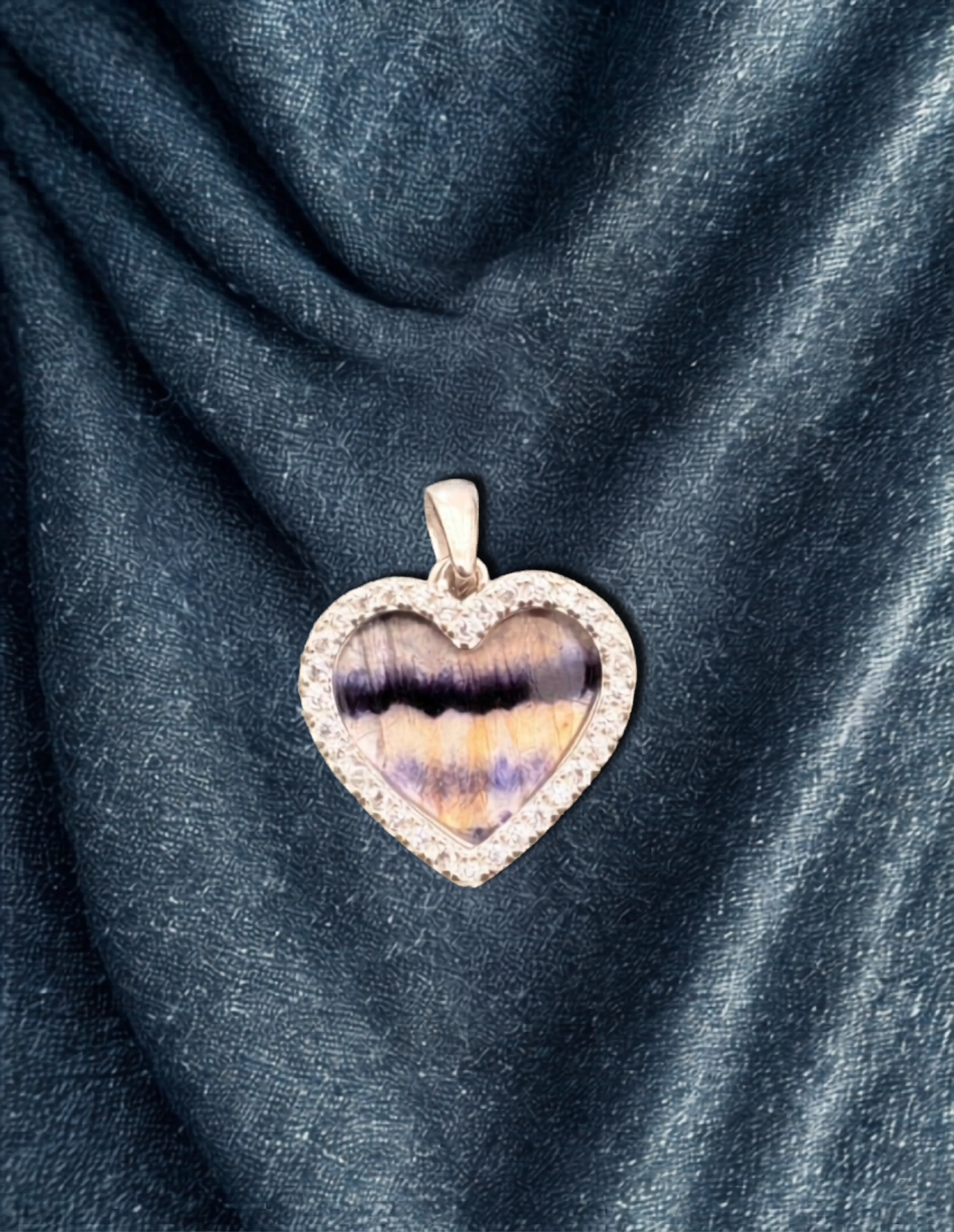 Heart shaped Pendant with swinging Cubic Zirconia